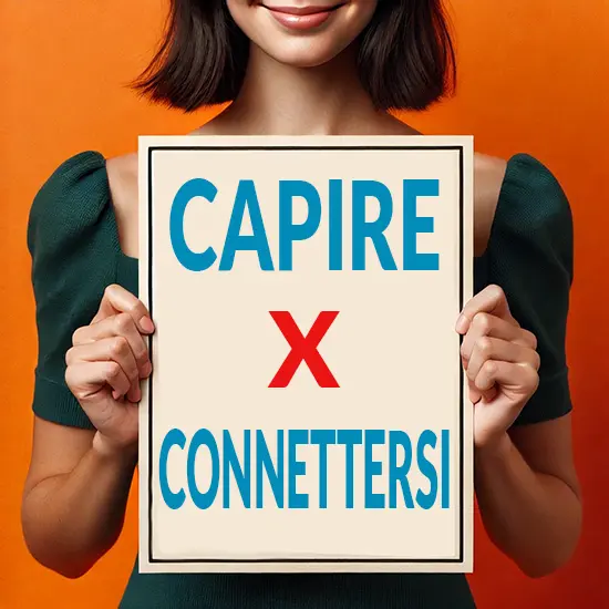 Donna sorride mentre tiene in mano un cartello con la scritta “Capire per connettersi”, messaggio di empatia e comunicazione nel contesto dell’autismo.